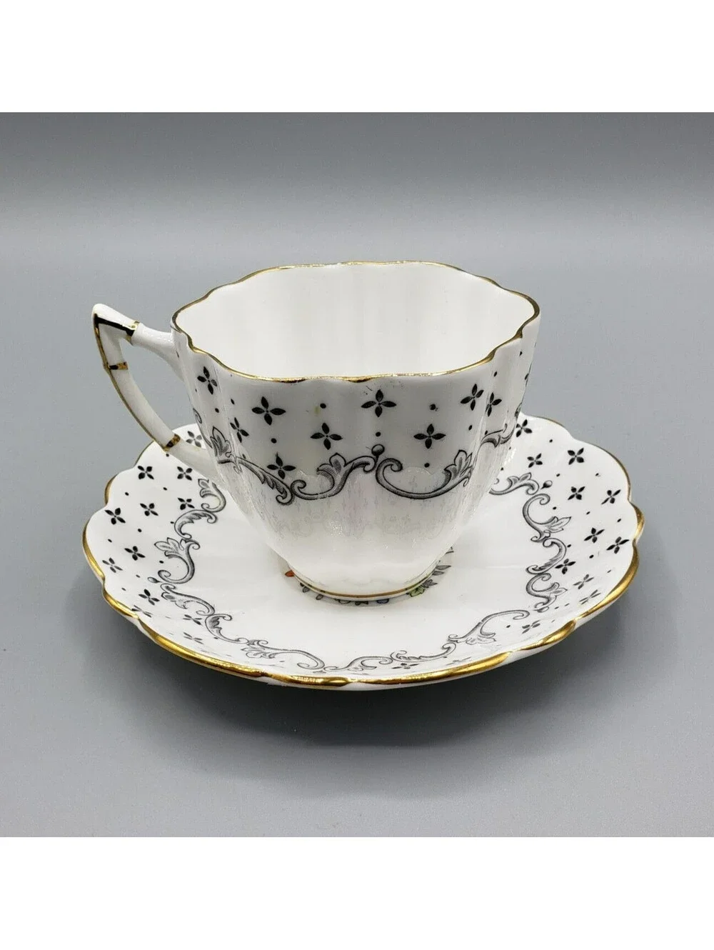 VTG Victoria C&E Teacup & Saucer Black Pattern Flower Medallion England Dainty